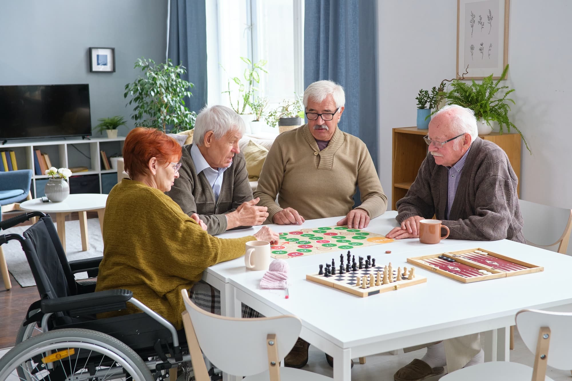 Senior people playing board games
